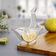 Bird-shaped hand juicer for citrus fruits